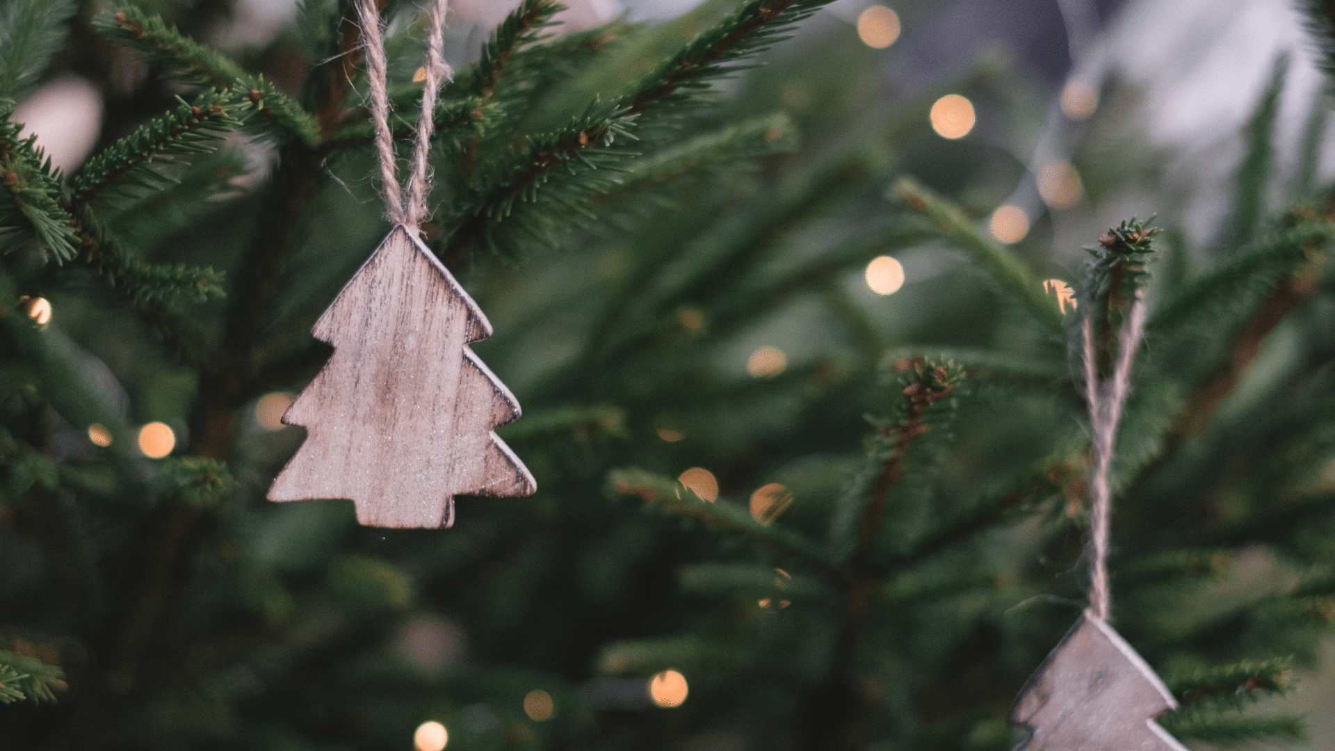 Sustainable wooden ornament on a Christmas tree